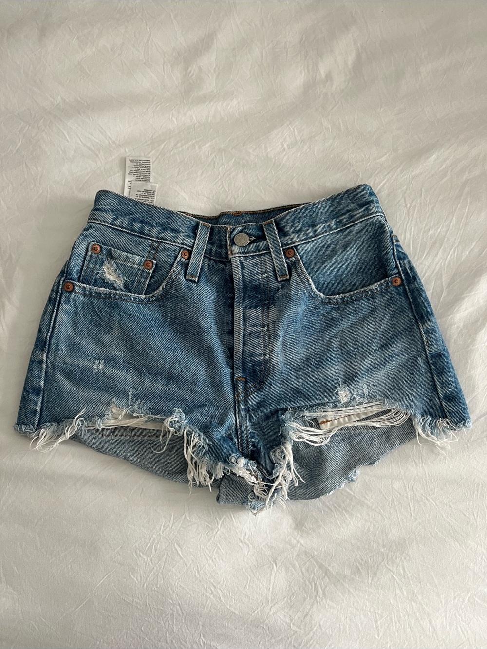 Levi's Distressed Light Blue Denim Cutoff Shorts